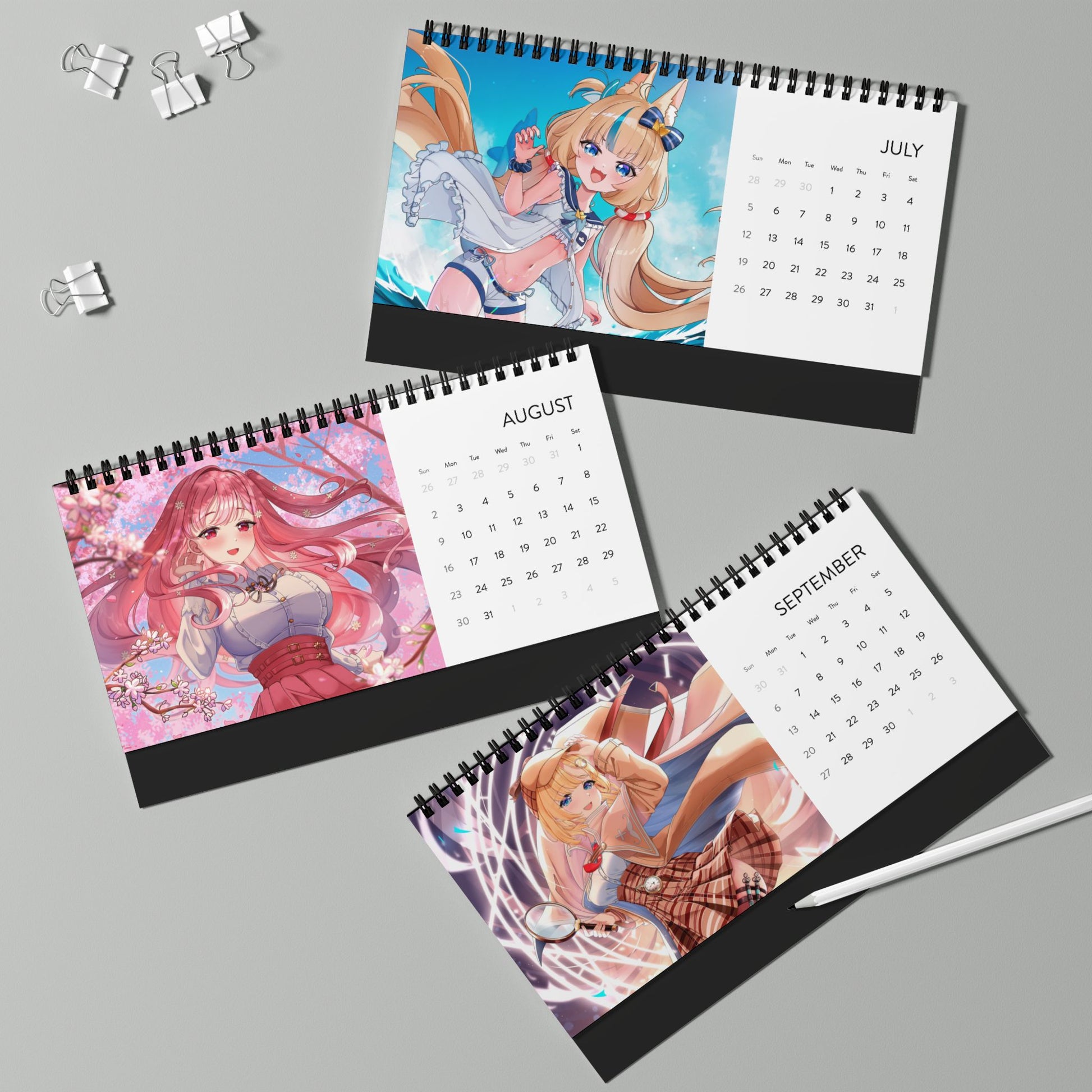 High-quality waifu VTuber wall and desktop calendars featuring 12 vibrant poster-style art prints inspired by Hololive, Sameko Saba, Nimi Nightmare, and Mint Fantome; perfect anime merch for VTuber fans and collectors lllustrated by Orihime Studio
