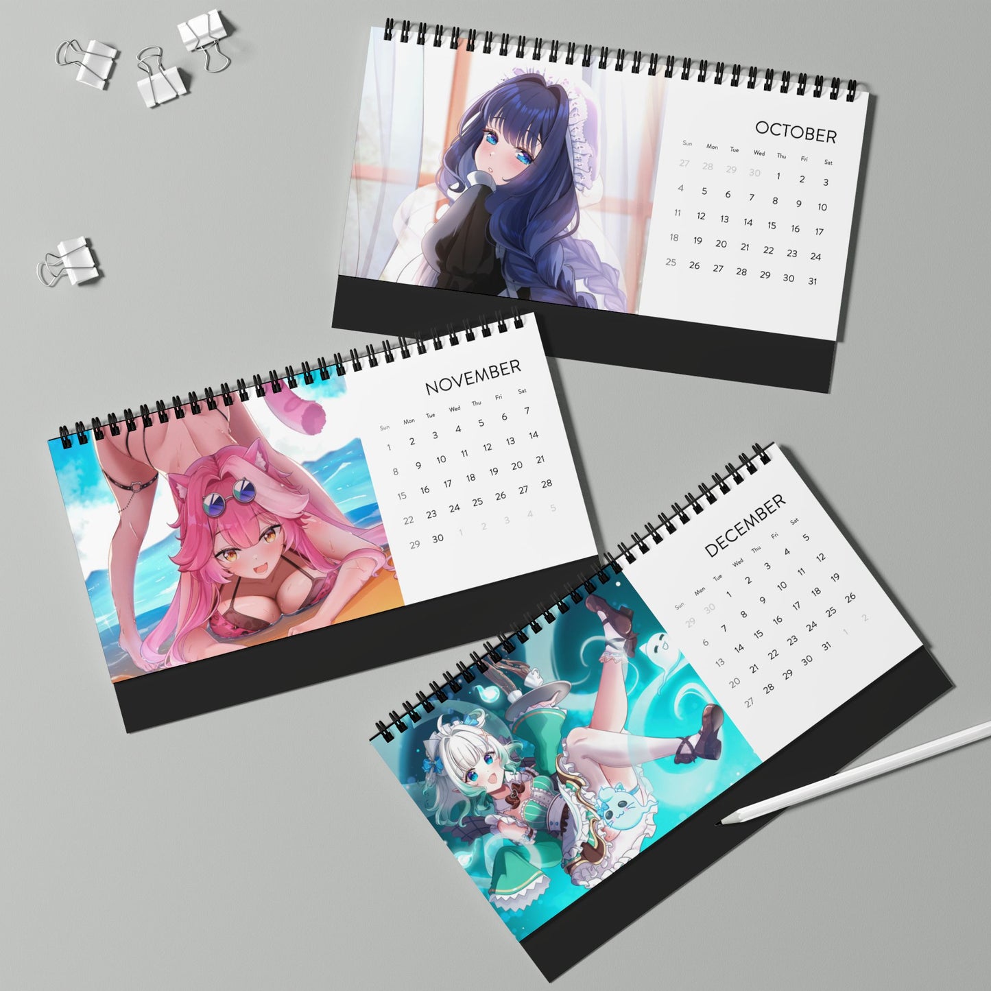 High-quality waifu VTuber wall and desktop calendars featuring 12 vibrant poster-style art prints inspired by Hololive, Sameko Saba, Nimi Nightmare, and Mint Fantome; perfect anime merch for VTuber fans and collectors lllustrated by Orihime Studio